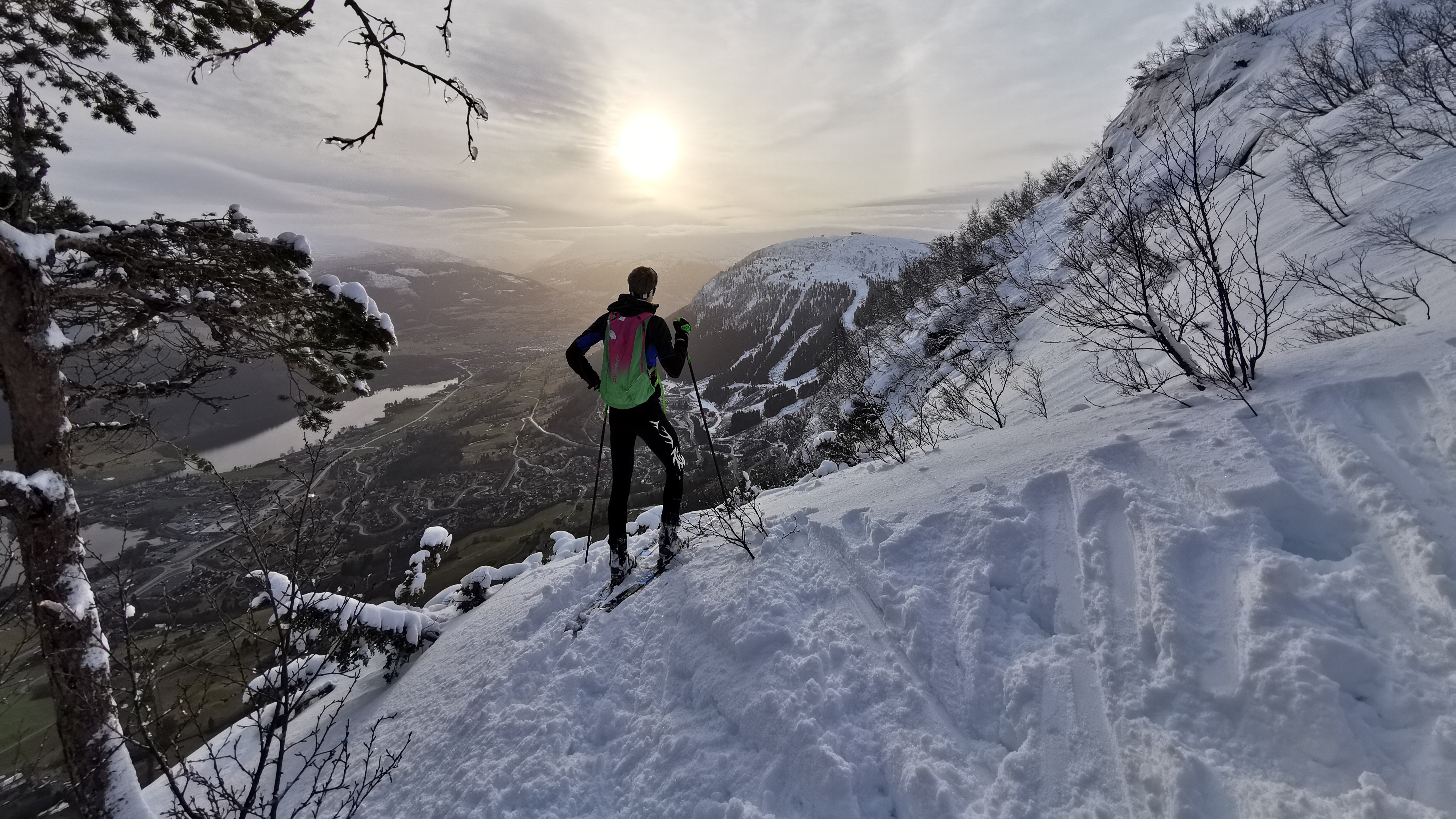 A guy skiing in the forrest in Voss - 